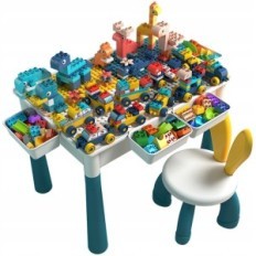 A table for children with blocks and chair. Creative set for fun and learning for toddlers exhibition
