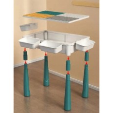 A table for children with blocks and chair. Creative set for fun and learning for toddlers exhibition