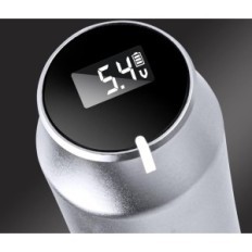 Eine Reihe von schwärzten Tätowierungsmaschinen mit einem Stift und Kartuschen, Silber