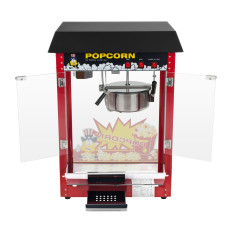 En bar för popcorn med en svart topp