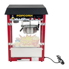 En bar för popcorn med en svart topp