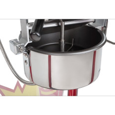 Um bar para pipoca com um pico preto
