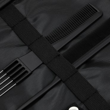 Valigetta per parrucchieri in materiale nero — primo piano della superficie