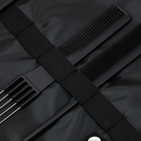 Valise de coiffure en matière noire — gros plan surface