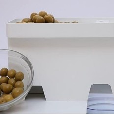 Used Electric Pelamatic olive grater made 3 white sizes