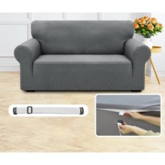 Dekk for en fold-out 4-sengs sofa ysten med grå armlener