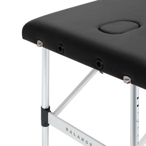 BALANCE aluminium folding massage table 3 segment black — close-up of the surface