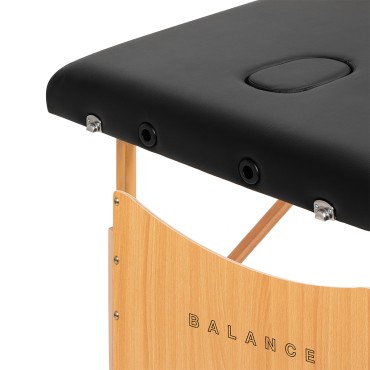 BALANCE vikbar massagelångbord i trä 2 segment 190x70 svart — närbild av yta