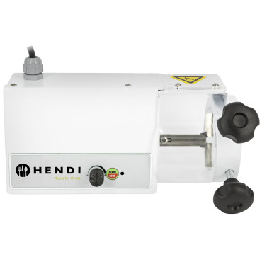 Knife for cutting extruded...