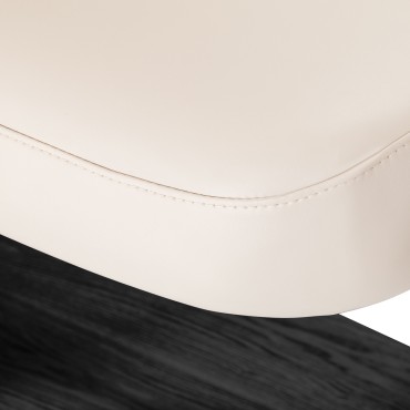 SPA-lepotuoli Sillon Relax kerma, mustalla jalustalla — lähikuva istuimesta
