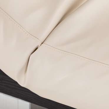 Poltrona SPA Sillon Comfort crema con base in legno scuro — primo piano della seduta