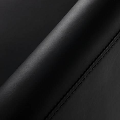 Hairdressing chair Omega Lyra black — close-up of the surface