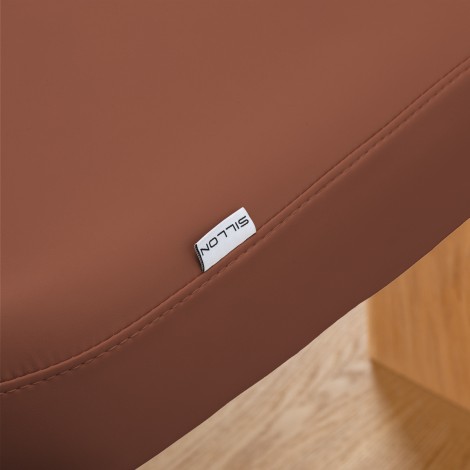 Lettino SPA Sillon Relax marrone con base in legno chiaro — primo piano dell'etichetta