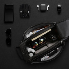 Bolsa de bicicleta en el tronco con una correa de hombro 13l negro