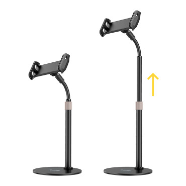 Carrinho de mesa e tablet telefone na mesa negra
