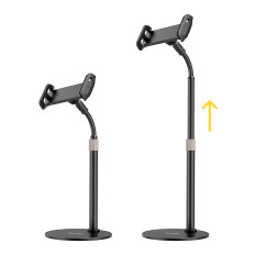 Carrinho de mesa e tablet telefone na mesa negra