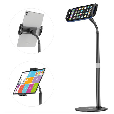 Carrinho de mesa e tablet telefone na mesa negra