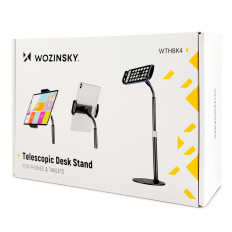 Tablet Stojan a tabletový telefón na čiernom stole
