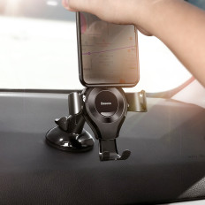 Pega de carro gravitacional para um telefone em um copo ou uma placa de distribuição. Preto oscculum