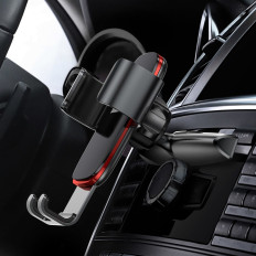 Metal car gravity handle on a black CD slot