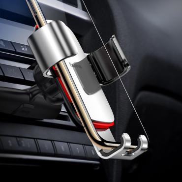 Metal car gravity handle on a black CD slot
