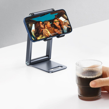 Taitettava jalusta Smartphone Tripodissa harmaalla puhelimella