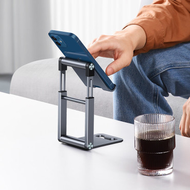 Suporte de suporte de dobramento sob o tripé do smartphone no telefone cinzento