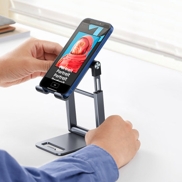 Faltständerstand unter Smartphone-Stativ auf graues Telefon