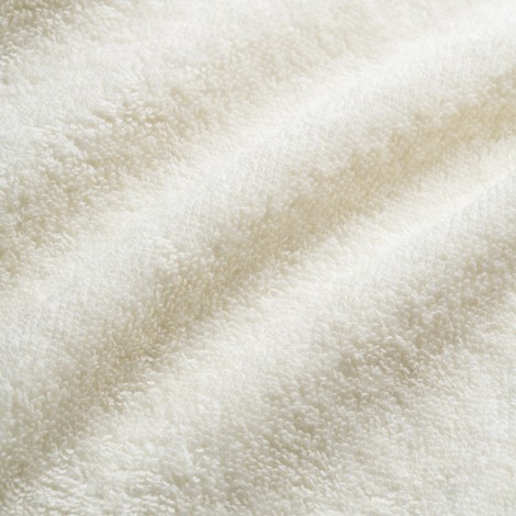 ACTIVESHOP krémszínű frottír lepedő 60 x 190 cm — közeli kép a felületről