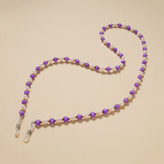 Ķēdes kulons glāzēm purpura pērles