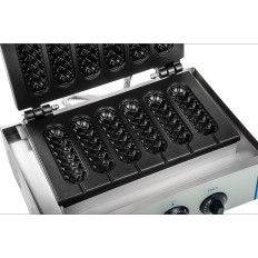 Wafelwafel op een stok en graanhonden Teflon