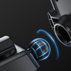 Κάτοχος στο τηλέφωνο με τηλεσκοπικό βραχίονα σε ένα ταμπλό και μαύρο γυαλί