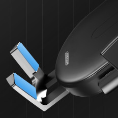 Titolare al telefono con bracci telescopici su un cruscotto e un vetro nero