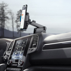 Holder on the phone with a telescopic arms on a dashboard and black glass