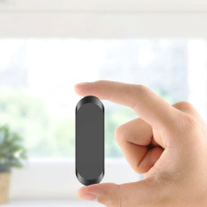 Självhäftande bilmagnetiskt handtag på svart instrumentbräda