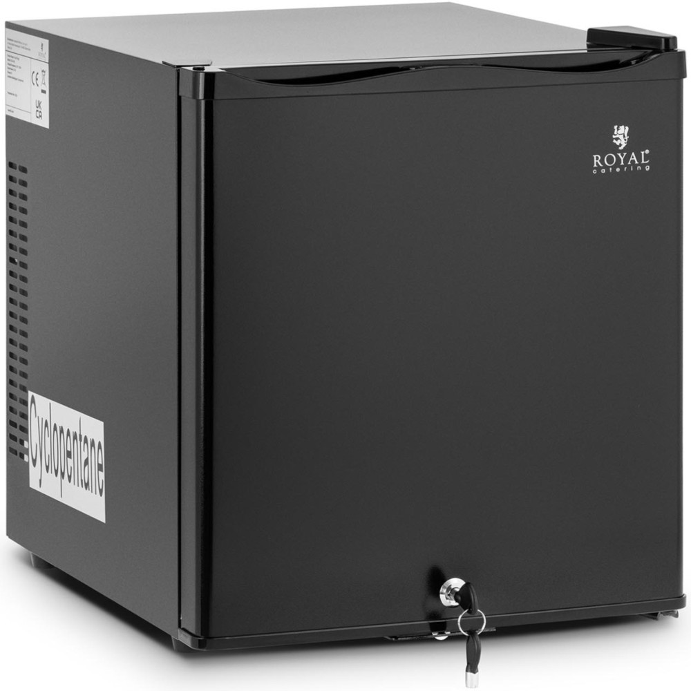 Frigorífico. Frigorífico do hotel. Minibar tranquilo. Fechado em uma chave 65w 28l