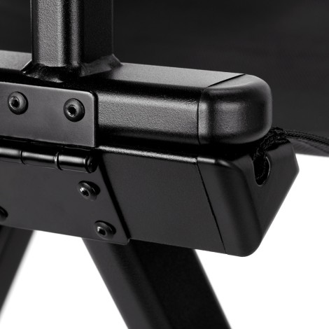 Black aluminum make-up chair — close-up of the base