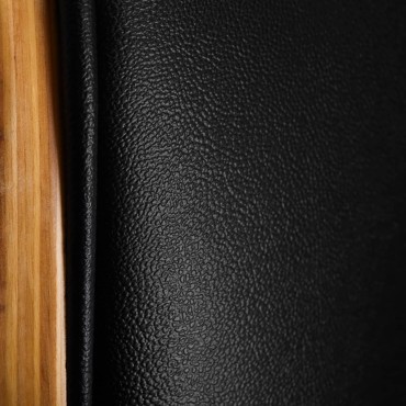 Hairdressing chair Gabbiano Florencja with adjustable headrest in black — close-up of the surface