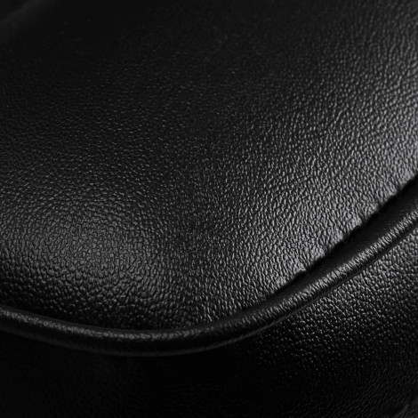 Hairdressing chair Gabbiano Florencja with adjustable headrest in black — close-up of the surface
