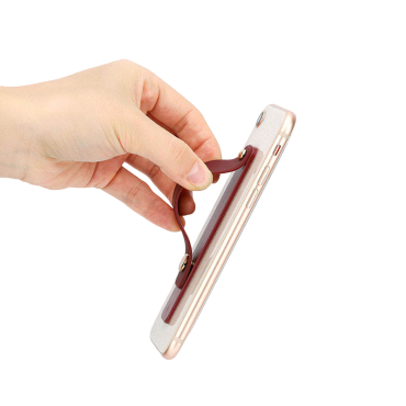 Samolepilni telefon na prstih z rožnatim drsnikom