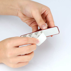 Självhäftande handtag för ditt finger med en grön reglage