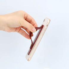 Self-adhesive handle for your finger with a green slider