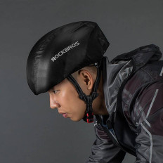 Raincoat on black bicycle helmet
