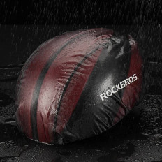 Raincoat on black bicycle helmet