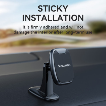 Magnetic phone holder on the dashboard in a black car