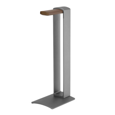 Stand for headphones standing on a desk with aluminum and wood silver