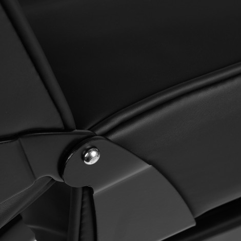 Sillón cosmético 557A con cubetas negro — detalle del reposabrazos