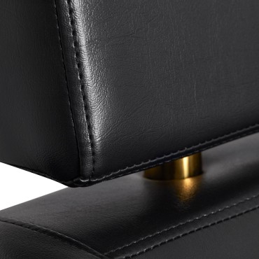 Gabbiano hairdressing chair Toledo gold black — close-up of the seat