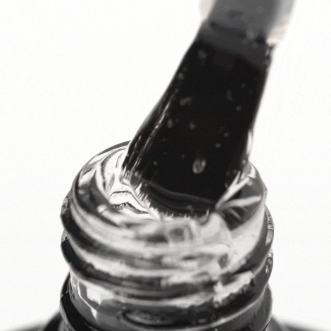 OCHO NAILS Flex Base 150 - 5 g joustava kuminen hybridi pohjamaali ohuille kynsille — lähikuva kahvasta
