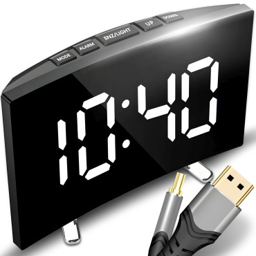 Electronic alarm clock with...